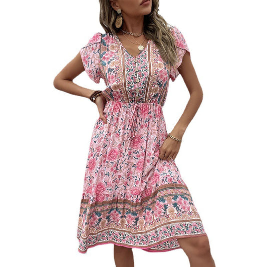 Vestido bohemio con estampado floral y escote en V de Isabella Sol.