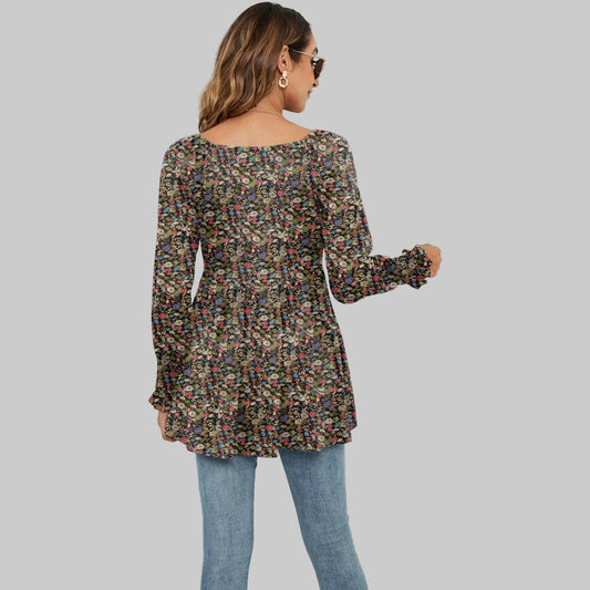 Top con cuello en V y mangas abullonadas con estampado floral de Isabella Sol.