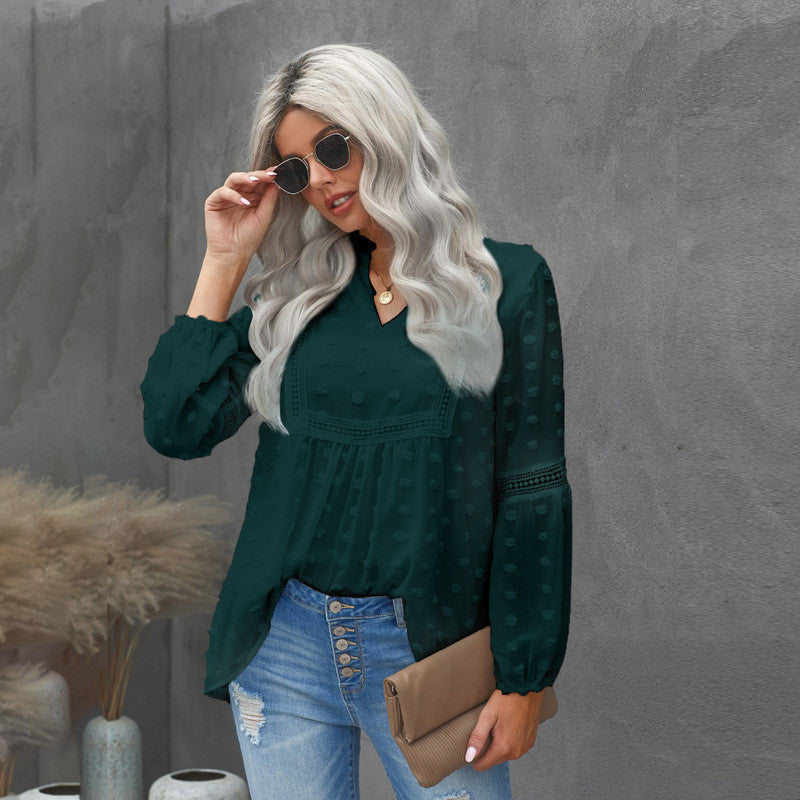 Blusa elegante de encaje con escote en V de Isabella Sol