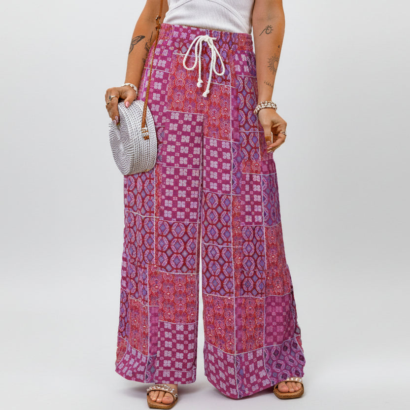 Pantalones anchos de Isabella Sol con estampado floral bohemio