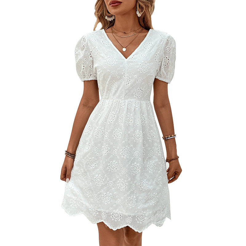 Elegante vestido Isabella Sol con mangas abullonadas y detalles de ojales.
