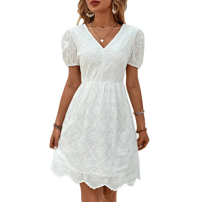 Elegante vestido Isabella Sol con mangas abullonadas y detalles de ojales.