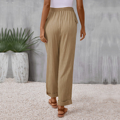 Pantalones rectos plisados color caqui de Isabella Sol