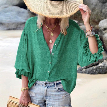 Blusa elegante de lunares abotonados de Isabella Sol