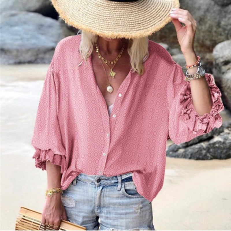 Blusa elegante de lunares abotonados de Isabella Sol