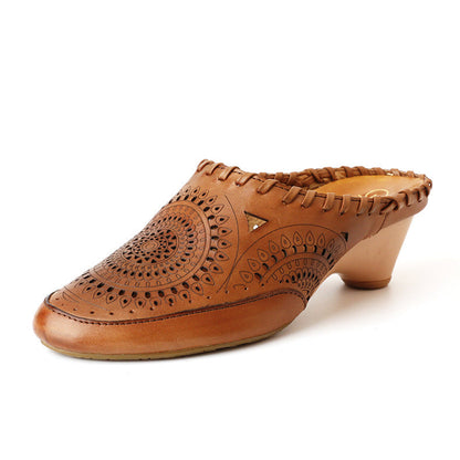 Sandalias de cuero vintage de tacón medio de Isabella Sol.