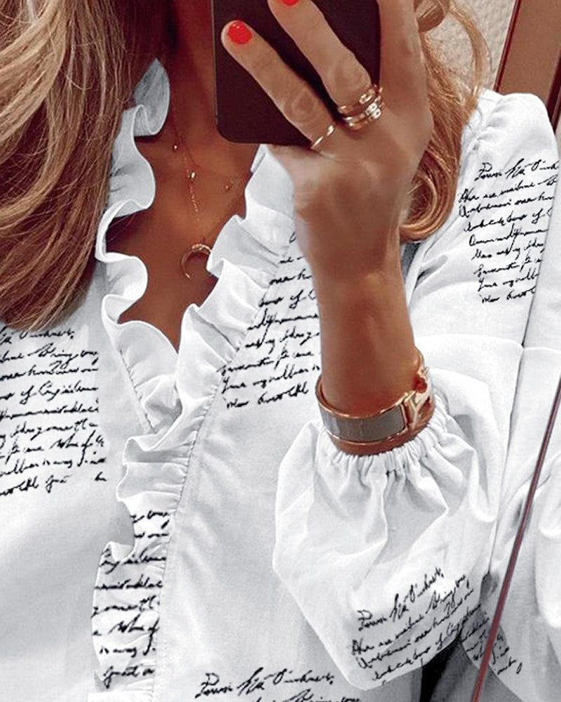 Blusa elegante de manga larga con volantes de Isabella Sol