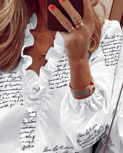 Blusa elegante de manga larga con volantes de Isabella Sol