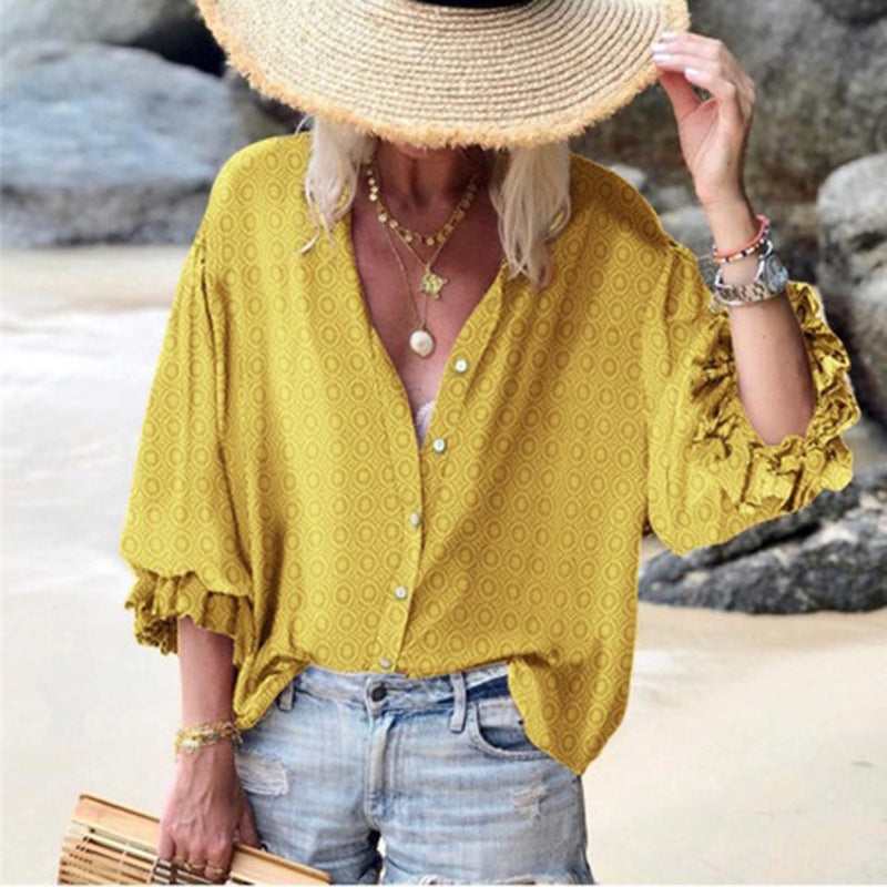 Blusa elegante de lunares abotonados de Isabella Sol