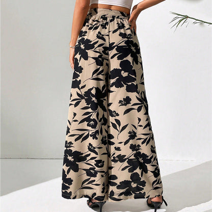 Pantalones de talle alto y pierna ancha con estampado floral de Isabella Sol.
