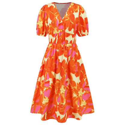 Vestido bohemio con estampado floral y escote en V de Isabella Sol.