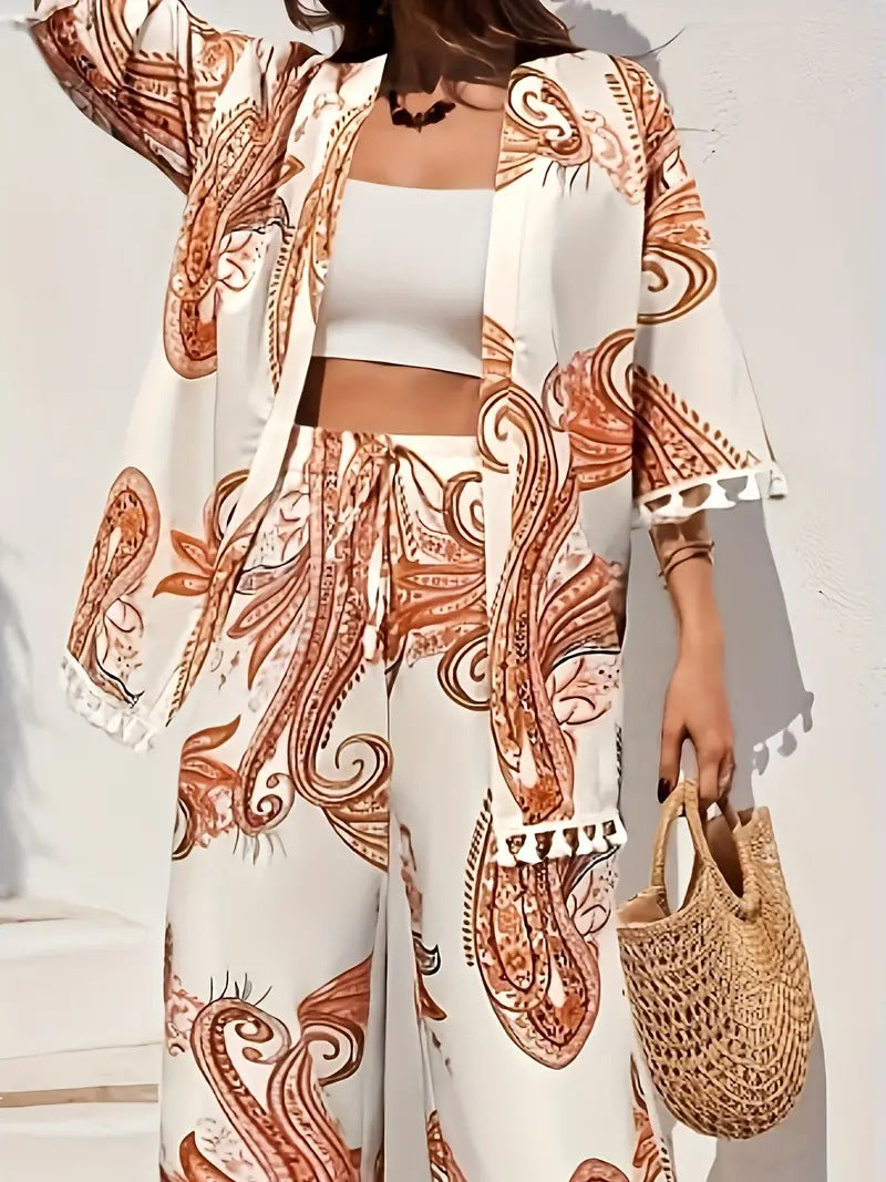 Elegante conjunto de cárdigan y pantalón estampado de Isabella Sol.