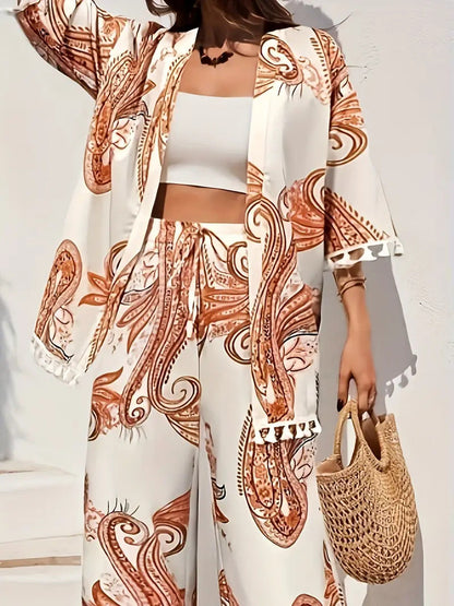 Elegante conjunto de cárdigan y pantalón estampado de Isabella Sol.