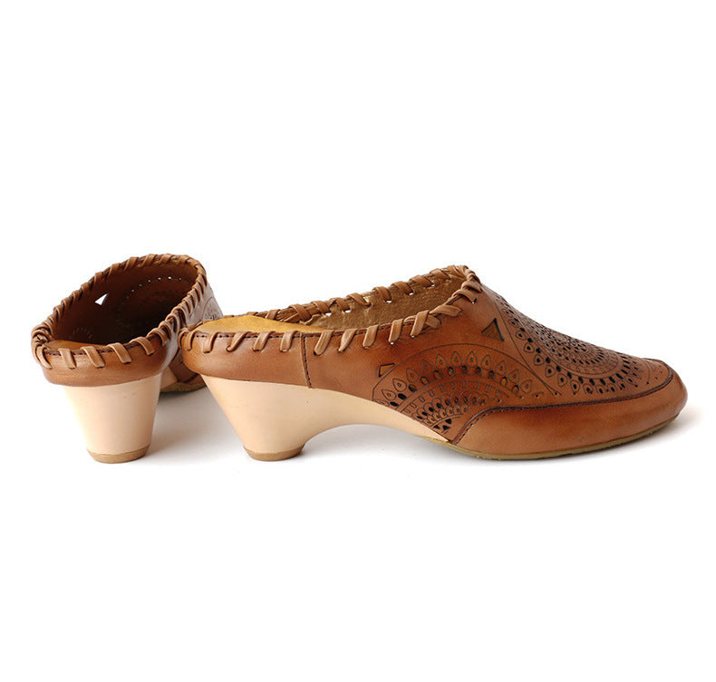 Sandalias de cuero vintage de tacón medio de Isabella Sol.