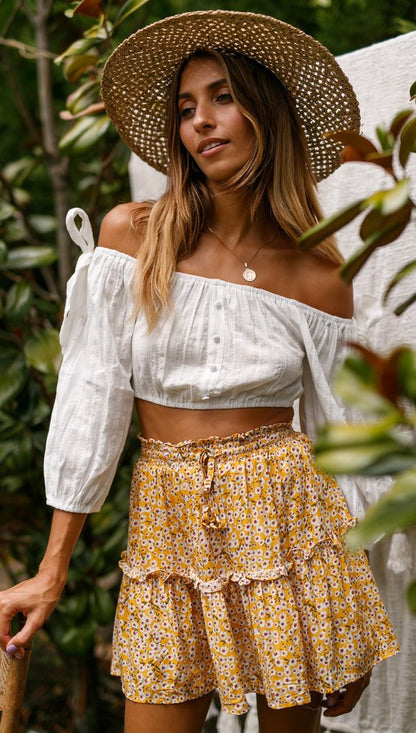 Falda de talle alto con volantes florales de Isabella Sol