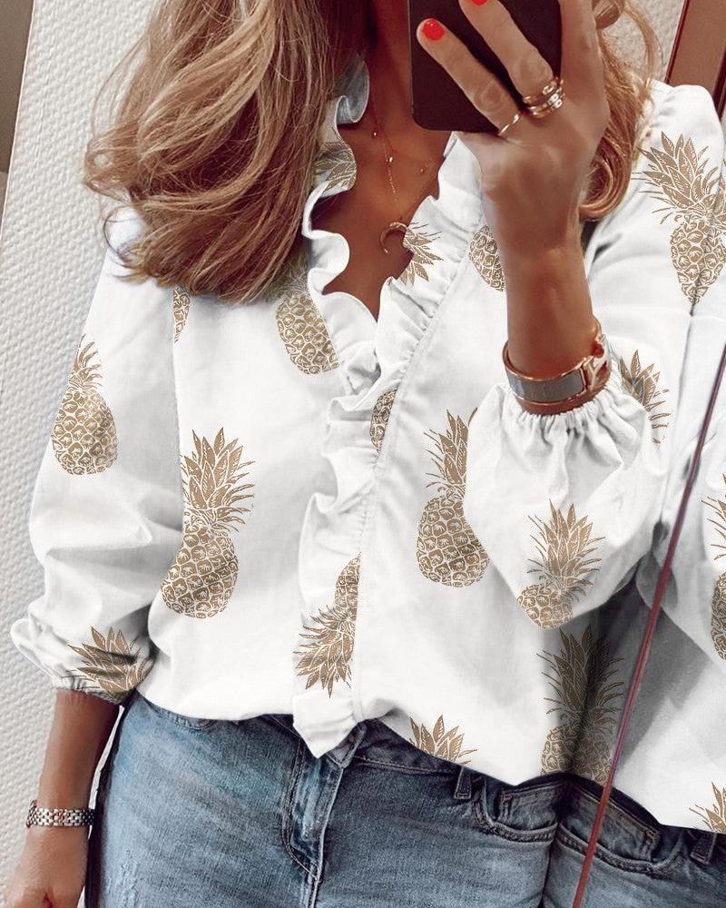 Blusa elegante de manga larga con volantes de Isabella Sol
