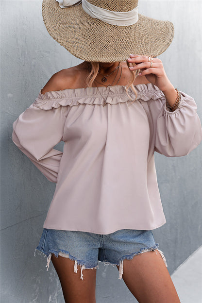 Elegante top de manga farol con hombros descubiertos de Isabella Sol