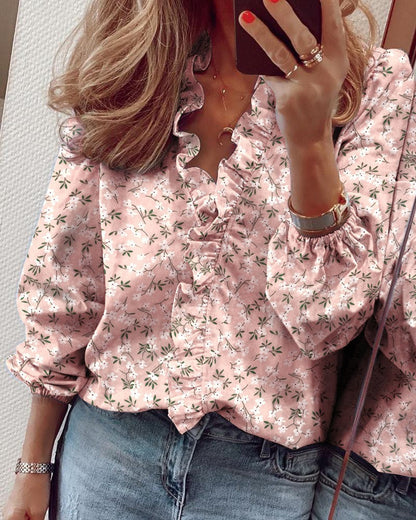 Blusa elegante de manga larga con volantes de Isabella Sol