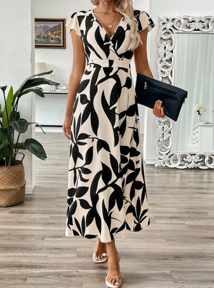 Elegante vestido largo estampado con escote en V de Isabella Sol.