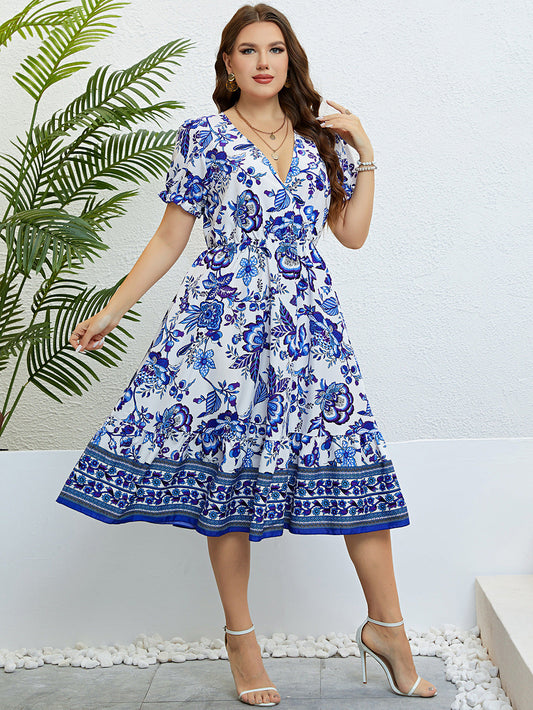 Vestido midi floral con escote en V de Isabella Sol