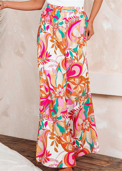 Pantalones de mujer holgados de talle alto con estampado de leopardo y pernera ancha estilo urbano.