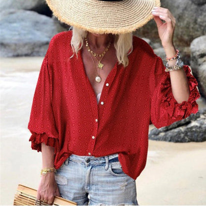 Blusa elegante de lunares abotonados de Isabella Sol