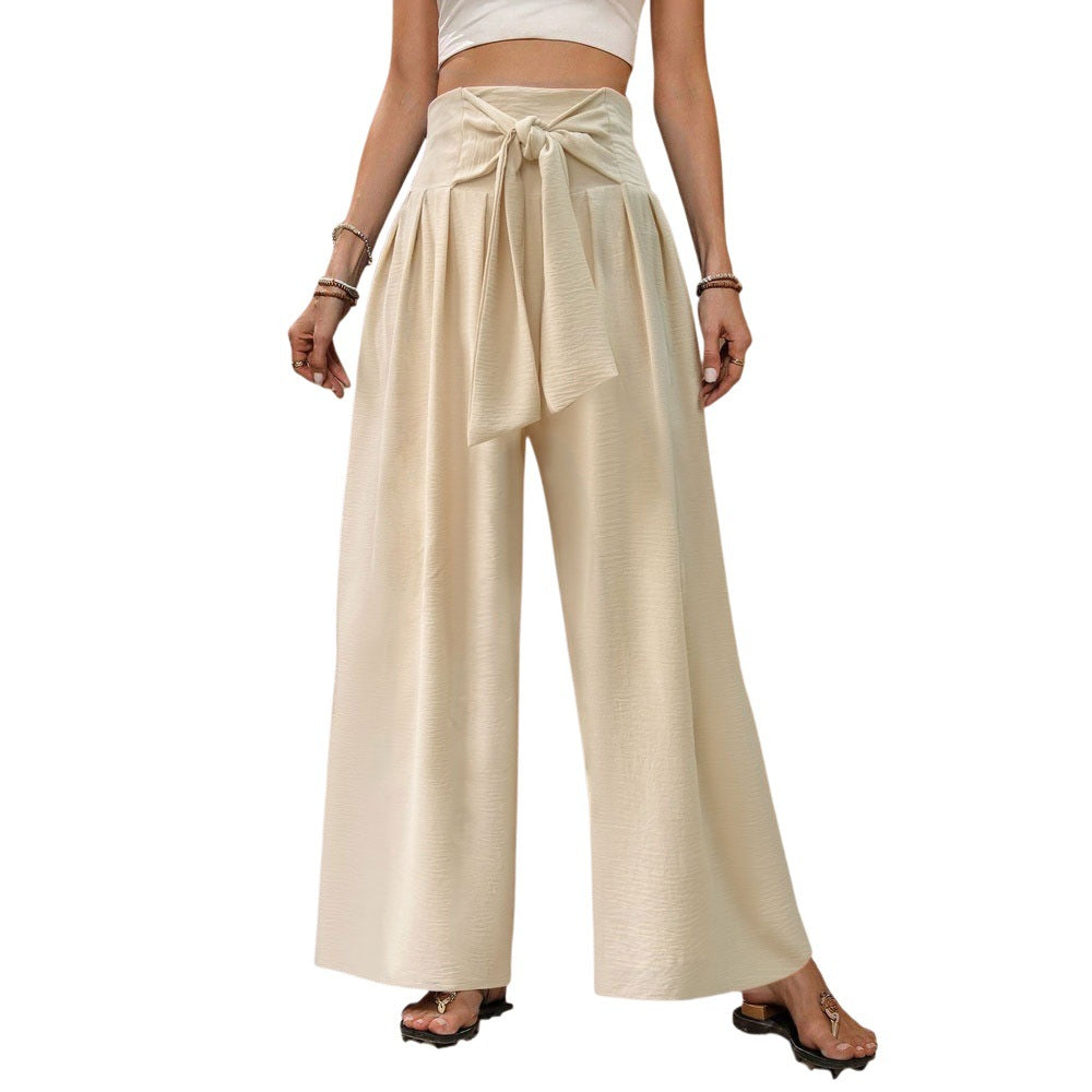 Pantalones casuales de mujer de talle alto, color liso, con lazo frontal y pernera ancha.