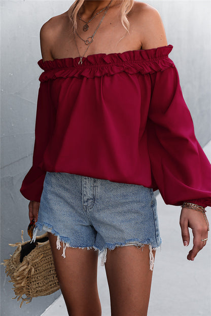 Elegante top de manga farol con hombros descubiertos de Isabella Sol
