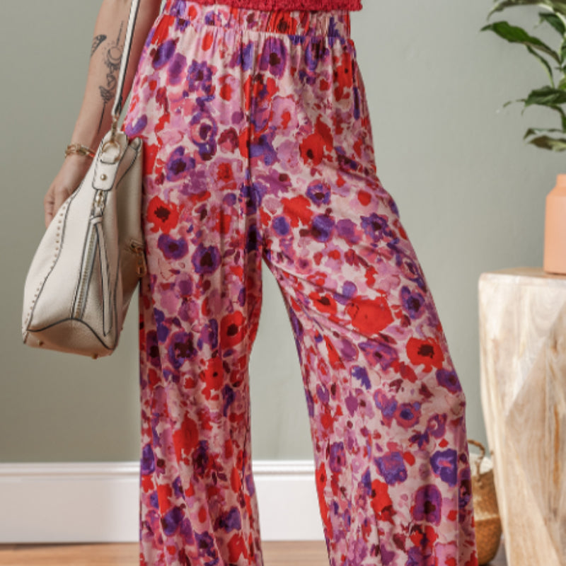 Pantalones de talle alto con estampado floral vibrante de Isabella Sol.