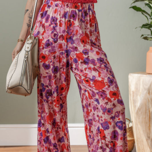 Pantalones de talle alto con estampado floral vibrante de Isabella Sol.