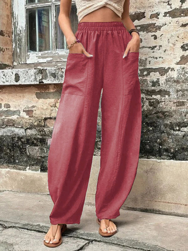 Pantalones harem de corte relajado Isabella Sol con bolsillos