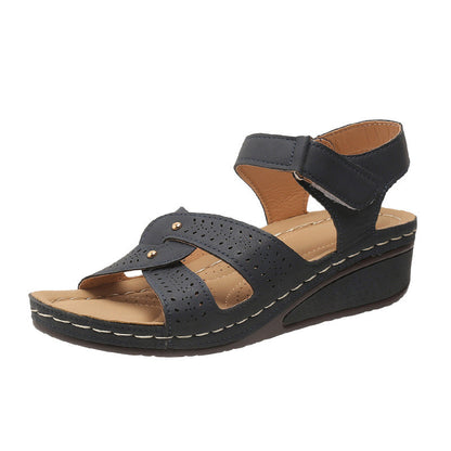 Elegantes sandalias de cuña de Isabella Sol