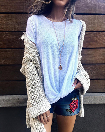 Blusa de verano elegante con diseño cruzado de Isabella Sol