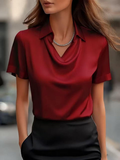 Blusa elegante de satén con escote barco de Isabella Sol.