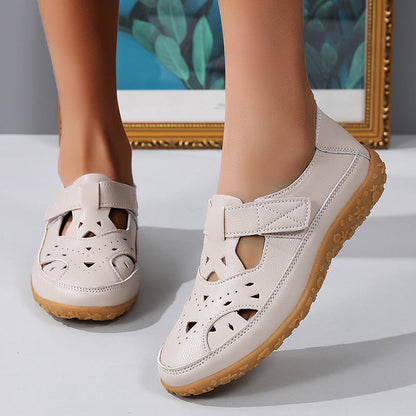 Hollowed Comfort Flat Sandals by Isabella Sol