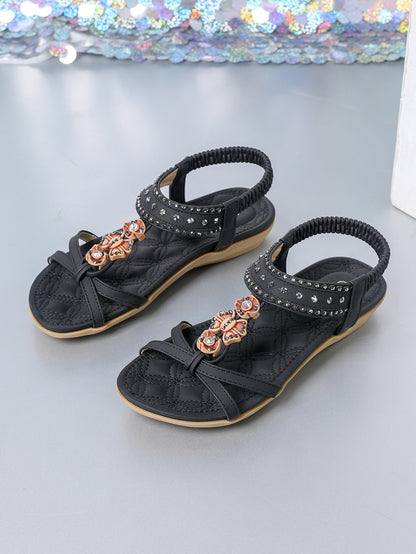 Elegantes sandalias planas con diamantes de Isabella Sol
