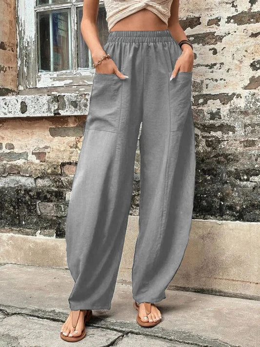 Pantalones harem de corte relajado Isabella Sol con bolsillos