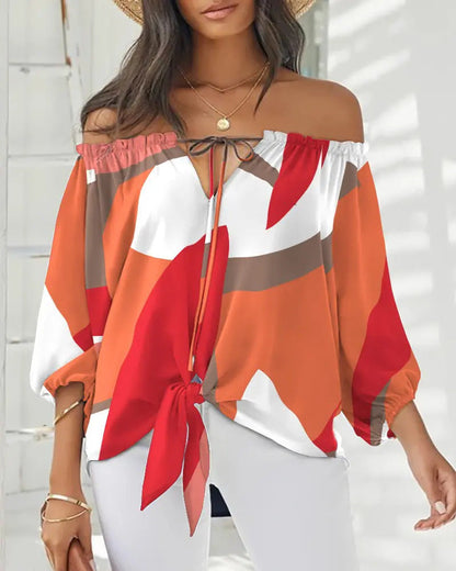 Elegante top estampado con hombros descubiertos de Isabella Sol