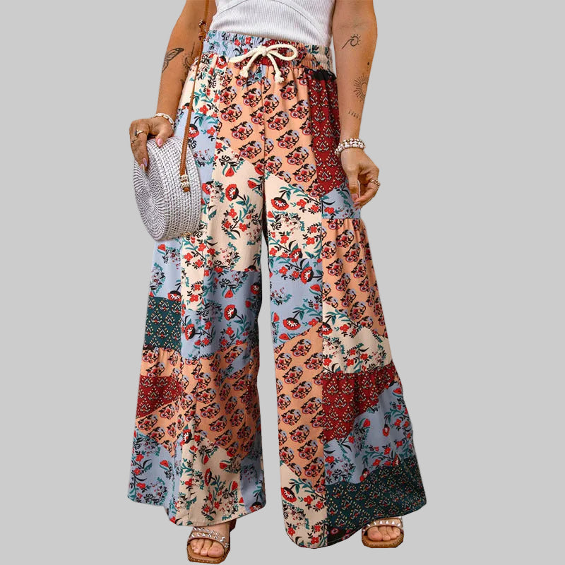 Pantalones anchos de Isabella Sol con estampado floral bohemio