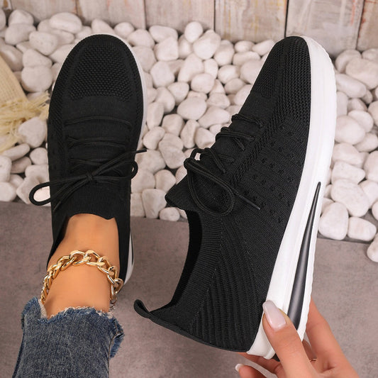 Zapatillas ligeras Isabella Sol Fly-Knit para uso diario.