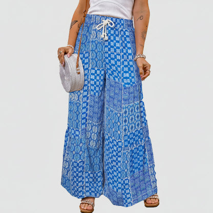 Pantalones anchos de Isabella Sol con estampado floral bohemio