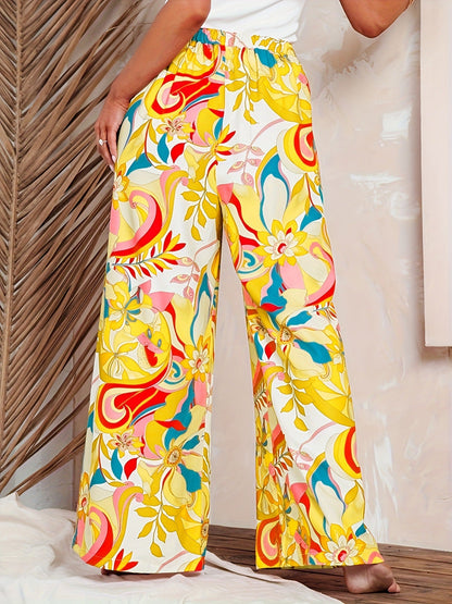 Pantalones de mujer holgados de talle alto con estampado de leopardo y pernera ancha estilo urbano.