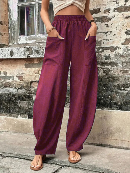 Pantalones harem de corte relajado Isabella Sol con bolsillos