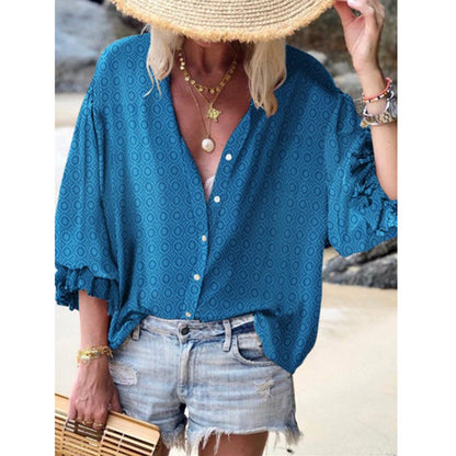 Blusa elegante de lunares abotonados de Isabella Sol