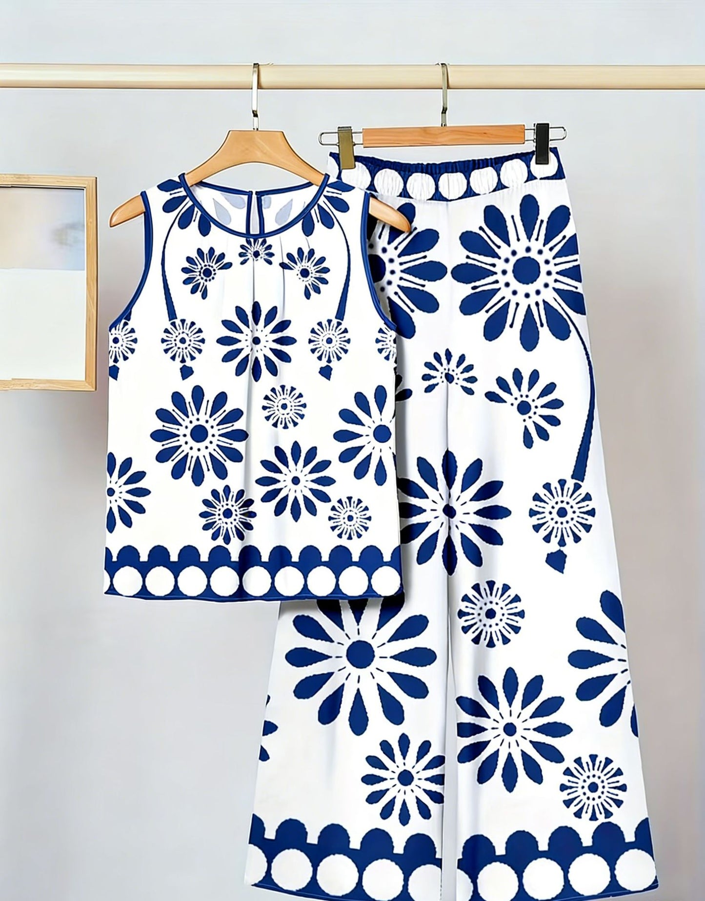 Conjunto de dos piezas para mujer: top sin mangas irregular y pantalón estampado a la moda.