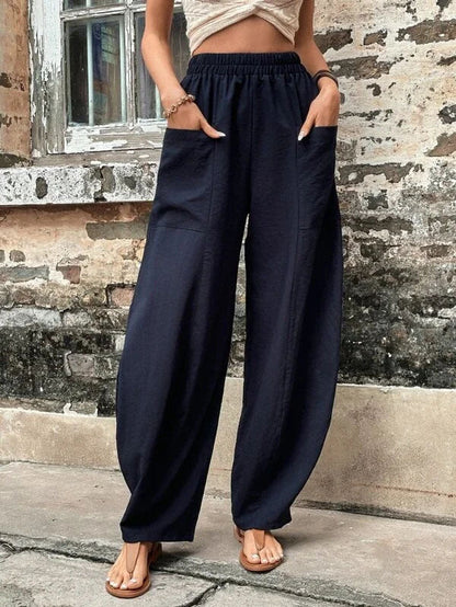Pantalones harem de corte relajado Isabella Sol con bolsillos