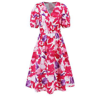Vestido bohemio con estampado floral y escote en V de Isabella Sol.