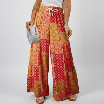 Pantalones anchos de Isabella Sol con estampado floral bohemio