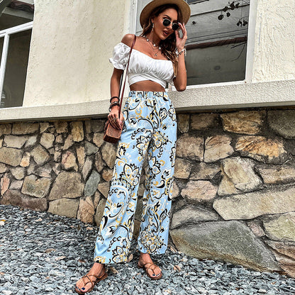 Pantalones rectos con estampado floral de Isabella Sol