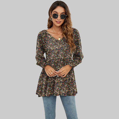 Top con cuello en V y mangas abullonadas con estampado floral de Isabella Sol.